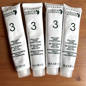 Four (4) Clairol Natural Instincts conditioner tubes separate from hair dye box